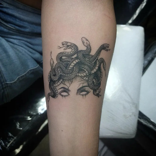 Small Blackwork Medusa with Snakes on Women Arm Tattoo by @megs_tatto.oficial