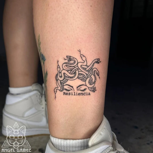 Small Blackwork Medusa with Snakes on Women Leg Tattoo by @gamez.tattoo