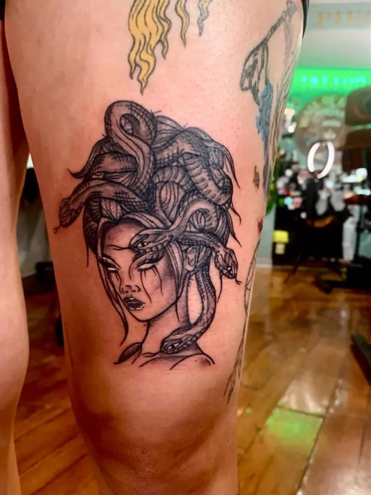 Small Blackwork Medusa with Snakes on Women Thigh Tattoo by @inkydeer_