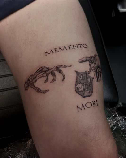 Small Blackwork Memento Mori Skeleton Hands Shield on Men Arm Tattoo by @mf_ivan