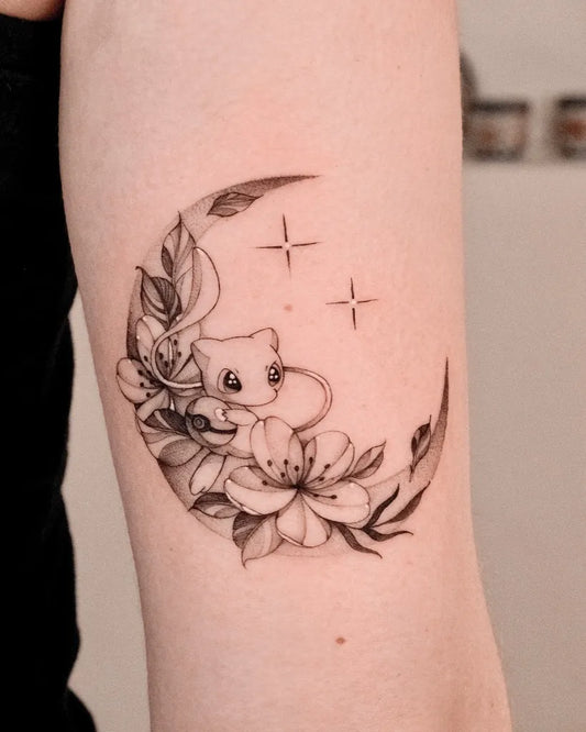 Small Blackwork Mew Pokemon Tattoo on Women Arm by @yodatattoos