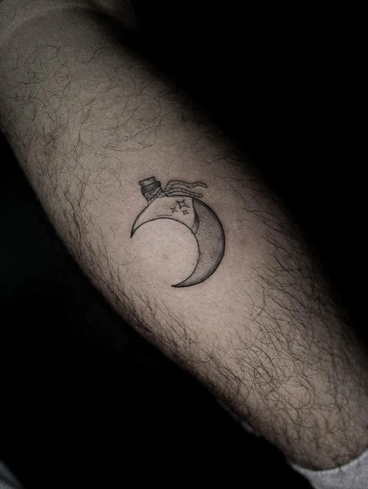 Small Blackwork Moon Bottle Tattoo on Men Calf by @prpleemoon.tattoo