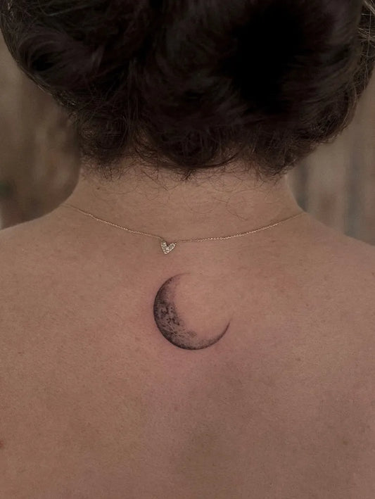 Small Blackwork Moon Tattoo on Women Nape by @molart.ink