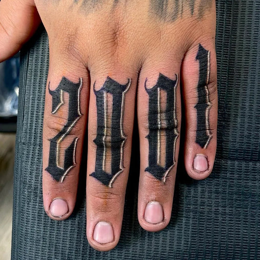 Small Blackwork Old English 2001 Tattoo on Men Fingers by @javy626tattoos