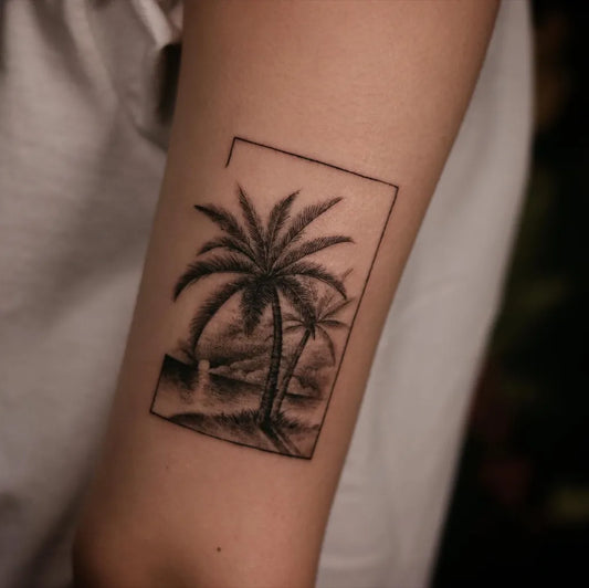 Small Blackwork Palm Tree and Landscape Tattoo on Women Arm by @sukza__art