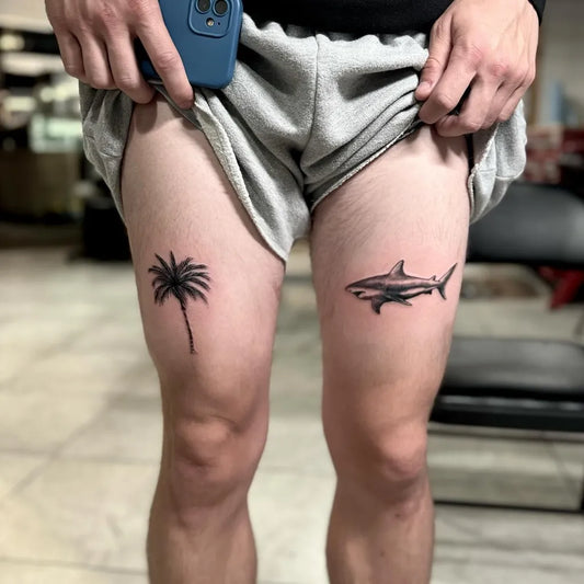 Small Blackwork Palm Tree and Shark Tattoo on Men Thigh by @theartistnine