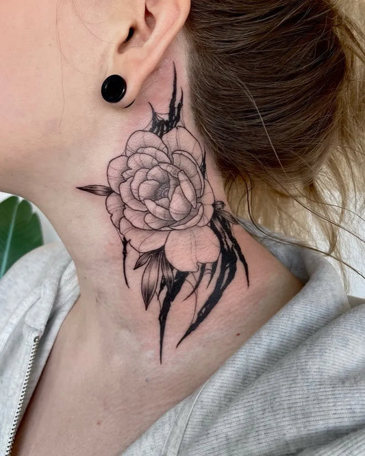 Small Blackwork Peony and Leaves on Women Neck Tattoo by @kush.tats