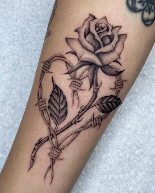 Small Blackwork Rose Barbed Wire on Women Arm Tattoo by @tattedbypoison