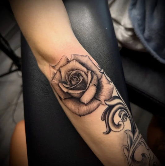 Small Blackwork Rose Vines on Women Arm Tattoo by @cat__tattoos