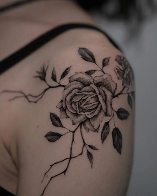 Small Blackwork Rose and Vines on Women Shoulder Tattoo by @claude.ttt