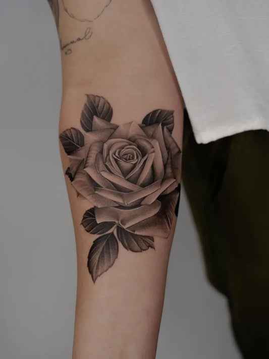Small Blackwork Rose on Men Forearm Tattoo by @alanhartt
