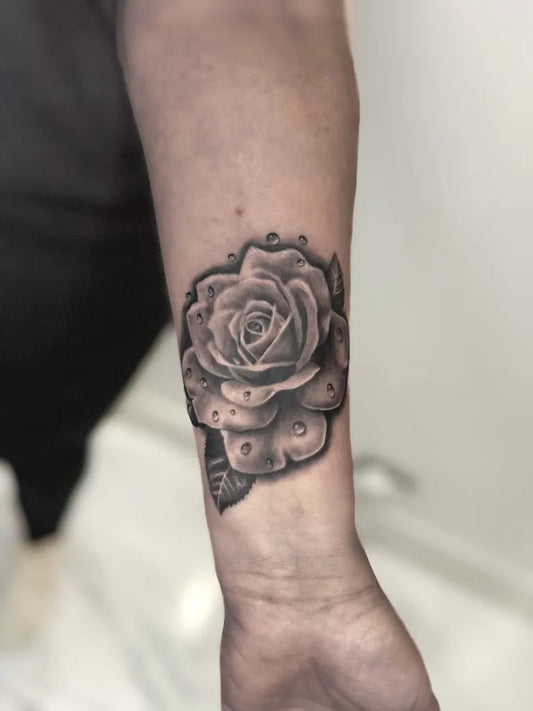 Small Blackwork Rose on Men Forearm Tattoo by @domie_inx