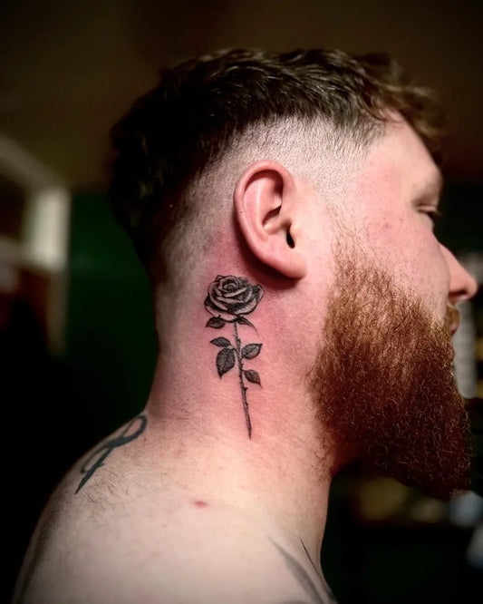 Small Blackwork Rose on Men Neck Tattoo by @ajltattoos