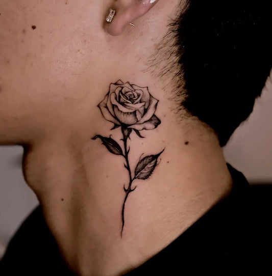Small Blackwork Rose on Men Neck Tattoo by @simon_inker