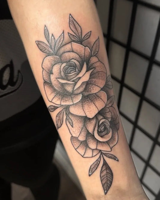Small Blackwork Roses and Leaves on Women Arm Tattoo by @newidwolverhampton