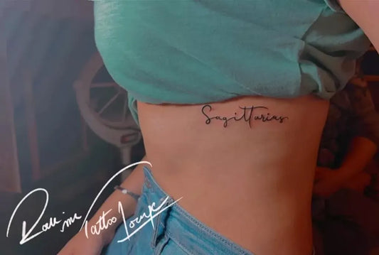 Small Blackwork Sagittarius Tattoo on Women Side by @rockinktattoolounge