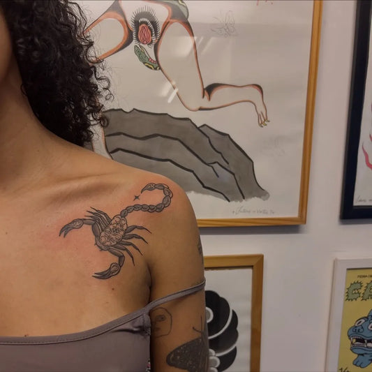 Small Blackwork Scorpion on Women Shoulder Tattoo by @julinatatu