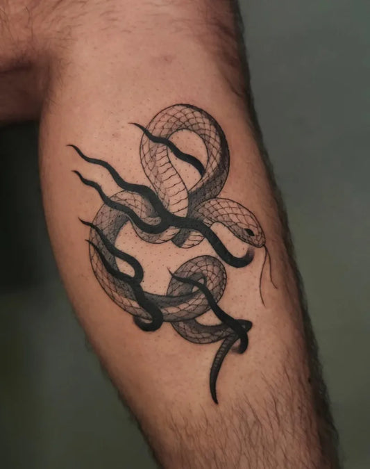 Small Blackwork Snake and Flames on Men Leg Tattoo by @milkywav_tt
