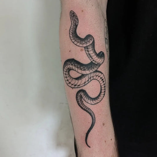 Small Blackwork Snake on Men Arm Tattoo by @icky_inks