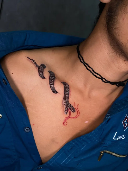 Small Blackwork Snake on Men Neck Tattoo by @priyanka_tattoo_07