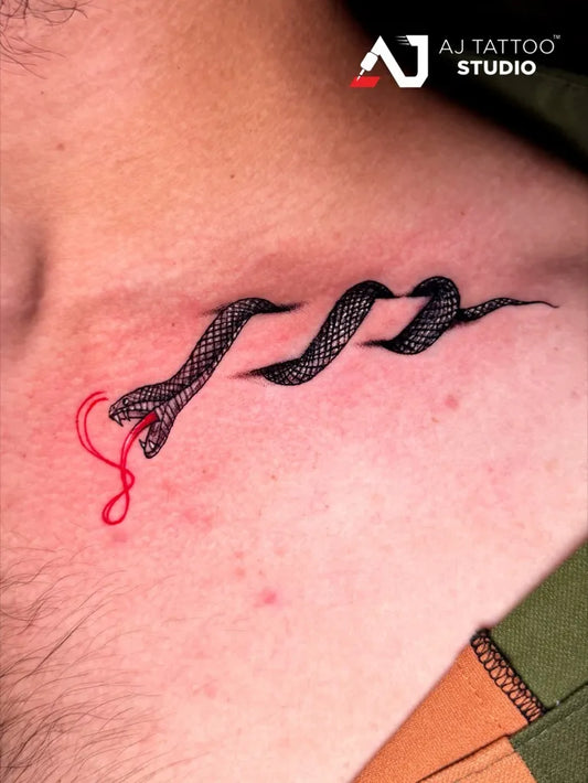 Small Blackwork Snakes on Men Shoulder Tattoo by @ajtattooostudio