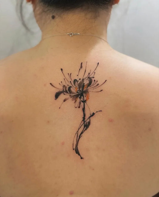 Small Blackwork Spider Lily Tattoo on Women Back by @meng_cz