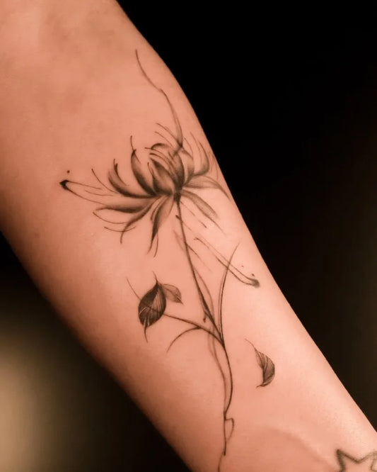 Small Blackwork Spider Lily Tattoo on Women Forearm by @silvieetattoo
