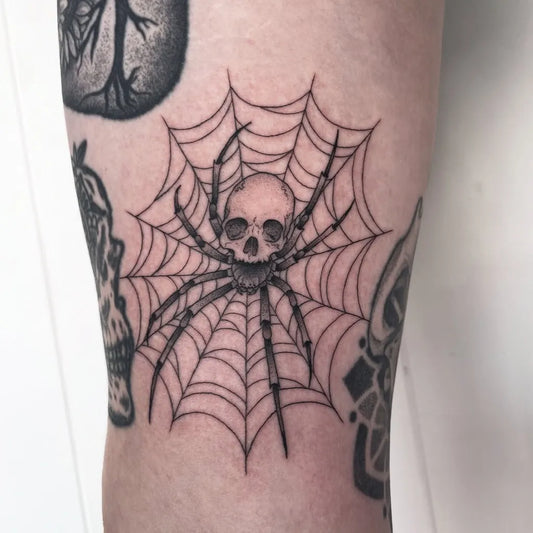 Small Blackwork Spider Skull Web on Women Arm Tattoo by @siarnthecatwitch