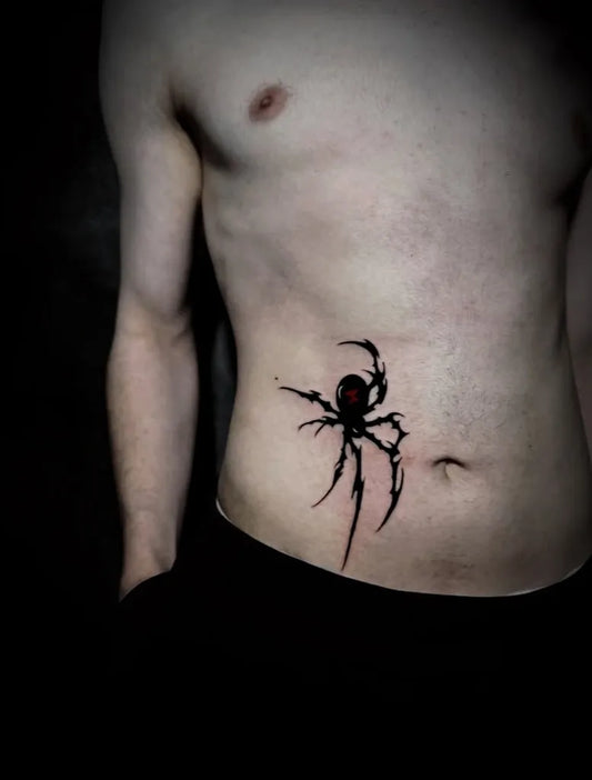 Small Blackwork Spider on Men Abdomen Tattoo by @skt_minimalist.tattoo