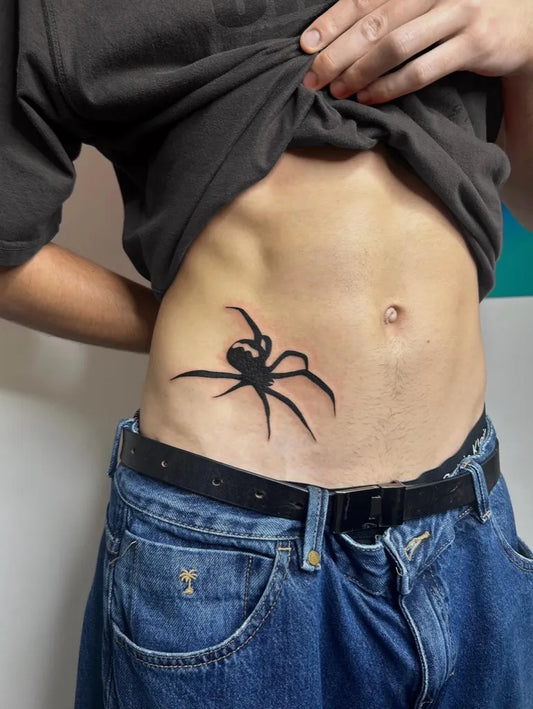 Small Blackwork Spider on Men Abs Tattoo by @amity_tats