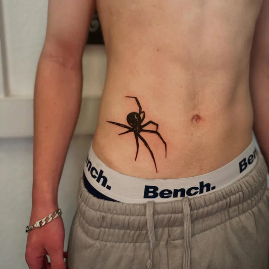 Small Blackwork Spider on Men Abs Tattoo by @claudiarosetattoos