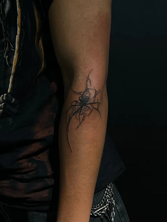 Small Blackwork Spider on Men Arm Tattoo by @hex__tattoo