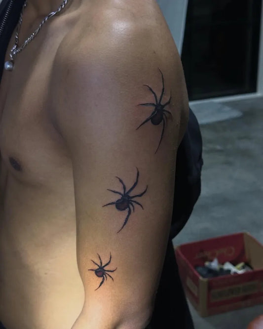 Small Blackwork Spider on Men Arm Tattoo by @mantra_tattoostudio