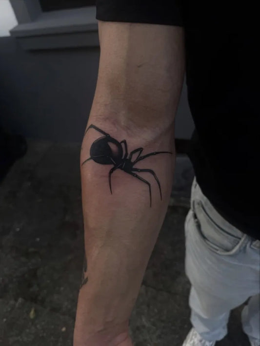 Small Blackwork Spider on Men Arm Tattoo by @truejuicy.tattoo