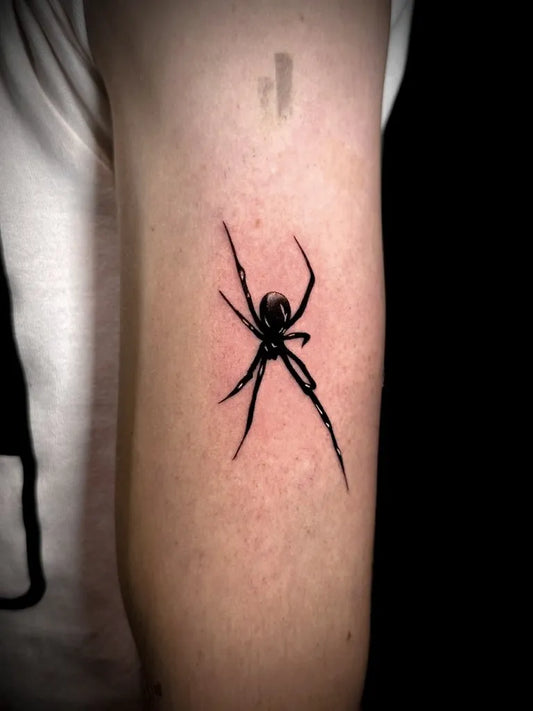 Small Blackwork Spider on Men Arm Tattoo by @vean_tattoo_budapest_astoria