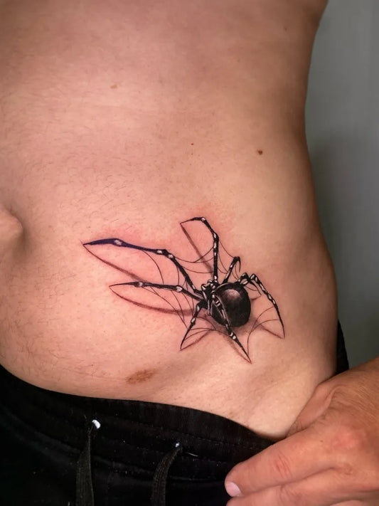 Small Blackwork Spider on Men Hip Tattoo by @saratattooss_