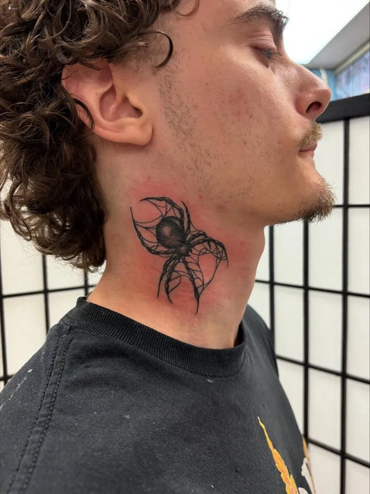 Small Blackwork Spider on Men Neck Tattoo by @gin.n.toxic.98