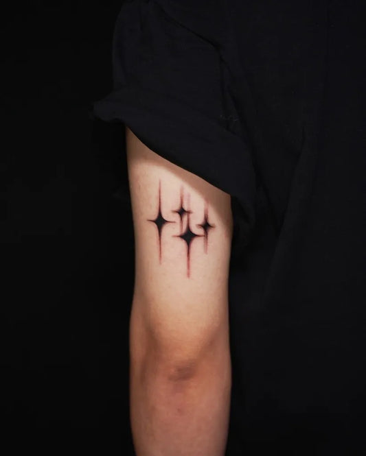 Small Blackwork Star Tattoo on Men Arm by @effy.tattooo