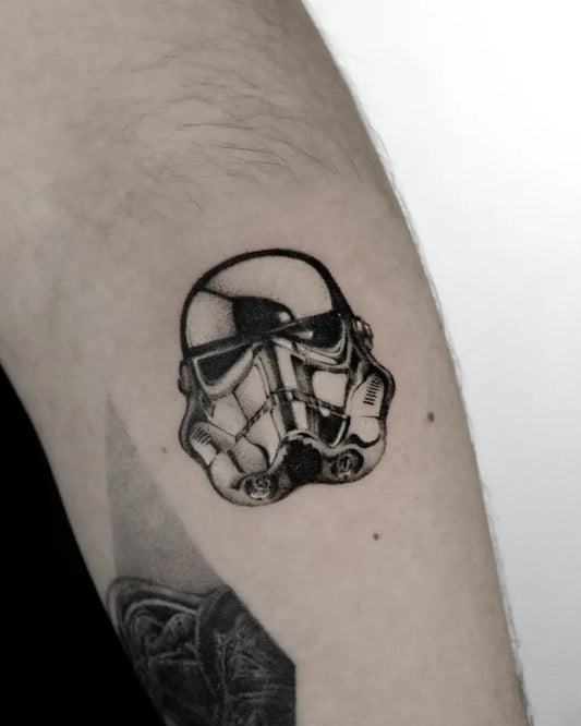 Small Blackwork Star Wars Stormtrooper Tattoo on Men Arm by @calegaritattoo