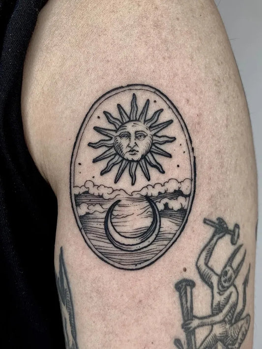 Small Blackwork Sun Moon Landscape on Men Arm Tattoo by @guzmanelmalo