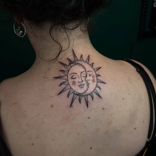 Small Blackwork Sun Moon on Women Back Tattoo by @tattoosbycay