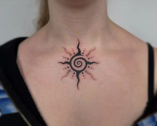 Small Blackwork Sun on Women Collarbone Tattoo by @by.siba