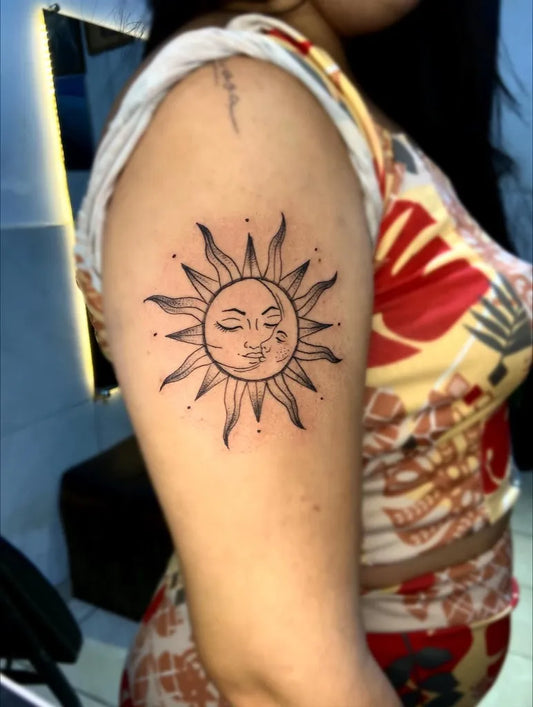 Small Blackwork Sun with Face on Women Arm Tattoo by @wolftattoojp