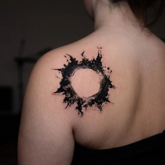 Small Blackwork Sunburst on Women Shoulder Tattoo by @soryu_tattoo