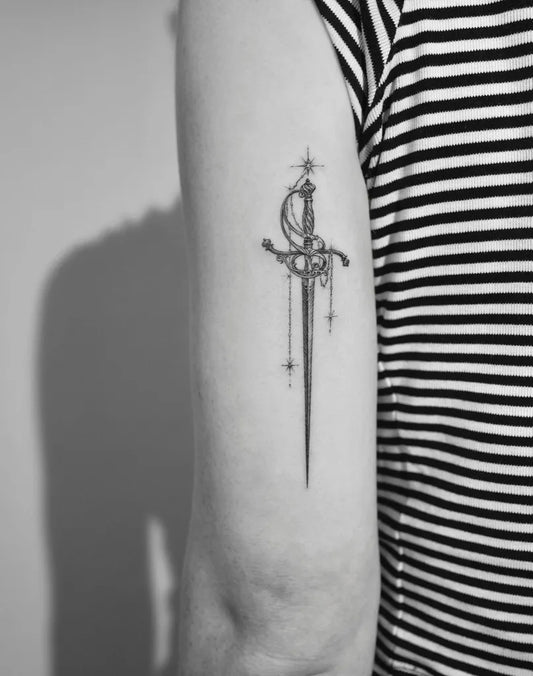 Small Blackwork Sword on Women Arm Tattoo by @jeon______