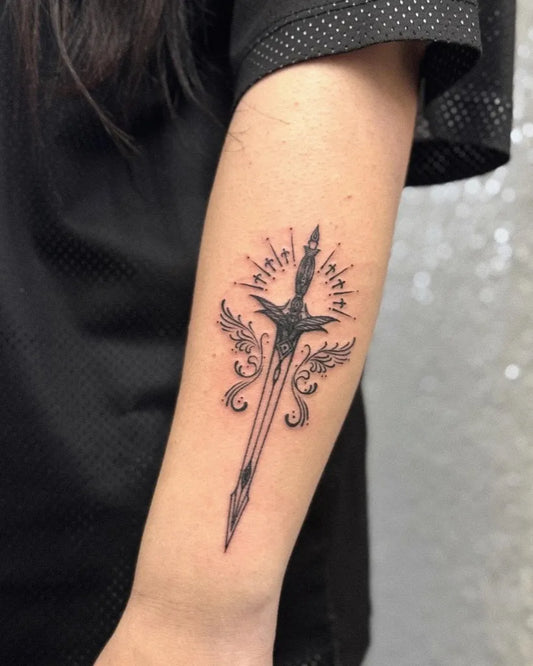 Small Blackwork Sword with Wings on Women Arm Tattoo by @hongma_tt