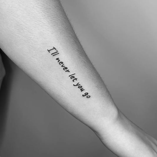 Small Blackwork Text Quote Tattoo on Women Arm by @inkedbyanita