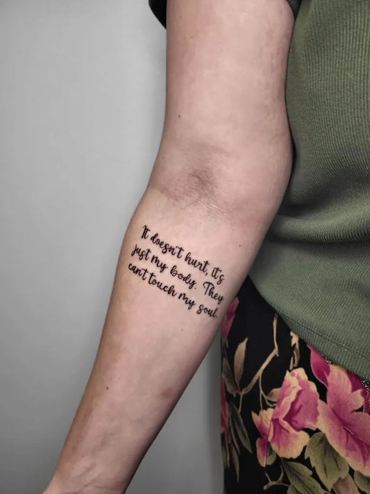 Small Blackwork Text Quote Tattoo on Women Arm by @solaristats