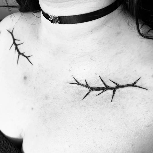 Small Blackwork Thorns Tattoo on Women Collarbone by @stabbygabby.gif