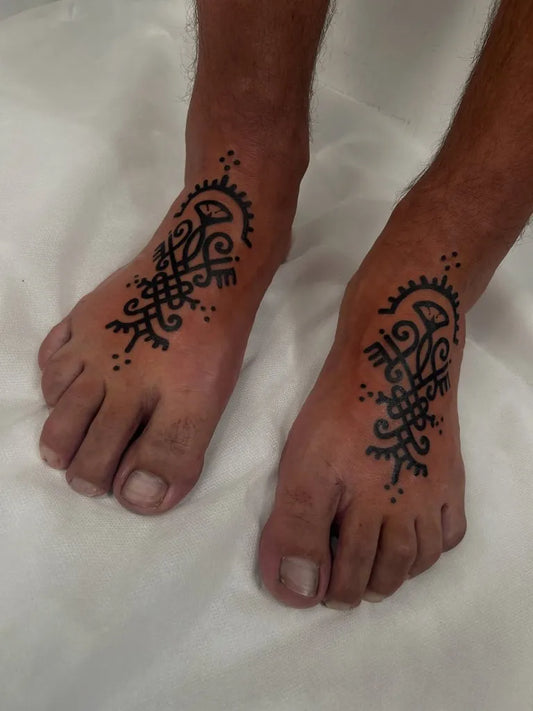 Small Blackwork Tribal Patterns Spiritual Tattoo on Men Feet by @juntaeflows888